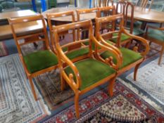 A set of six Yewwood dining chairs
