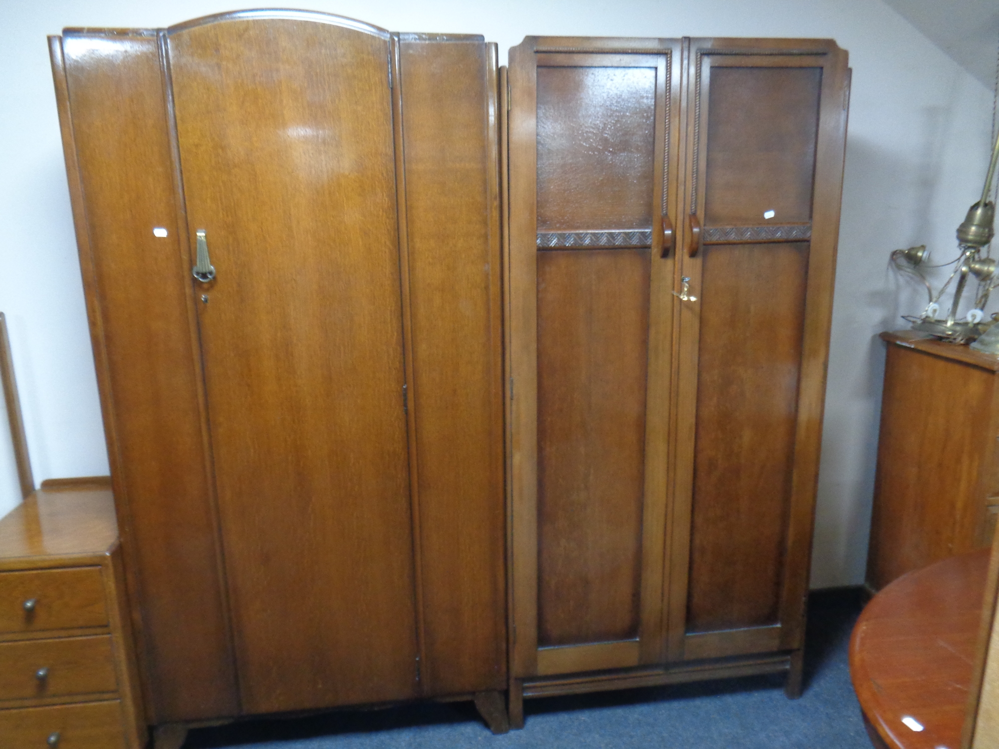 A 20th century Gentleman's double door wardrobe retailed by Bevans of Newcastle together with a