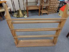 An antique pine Delft rack