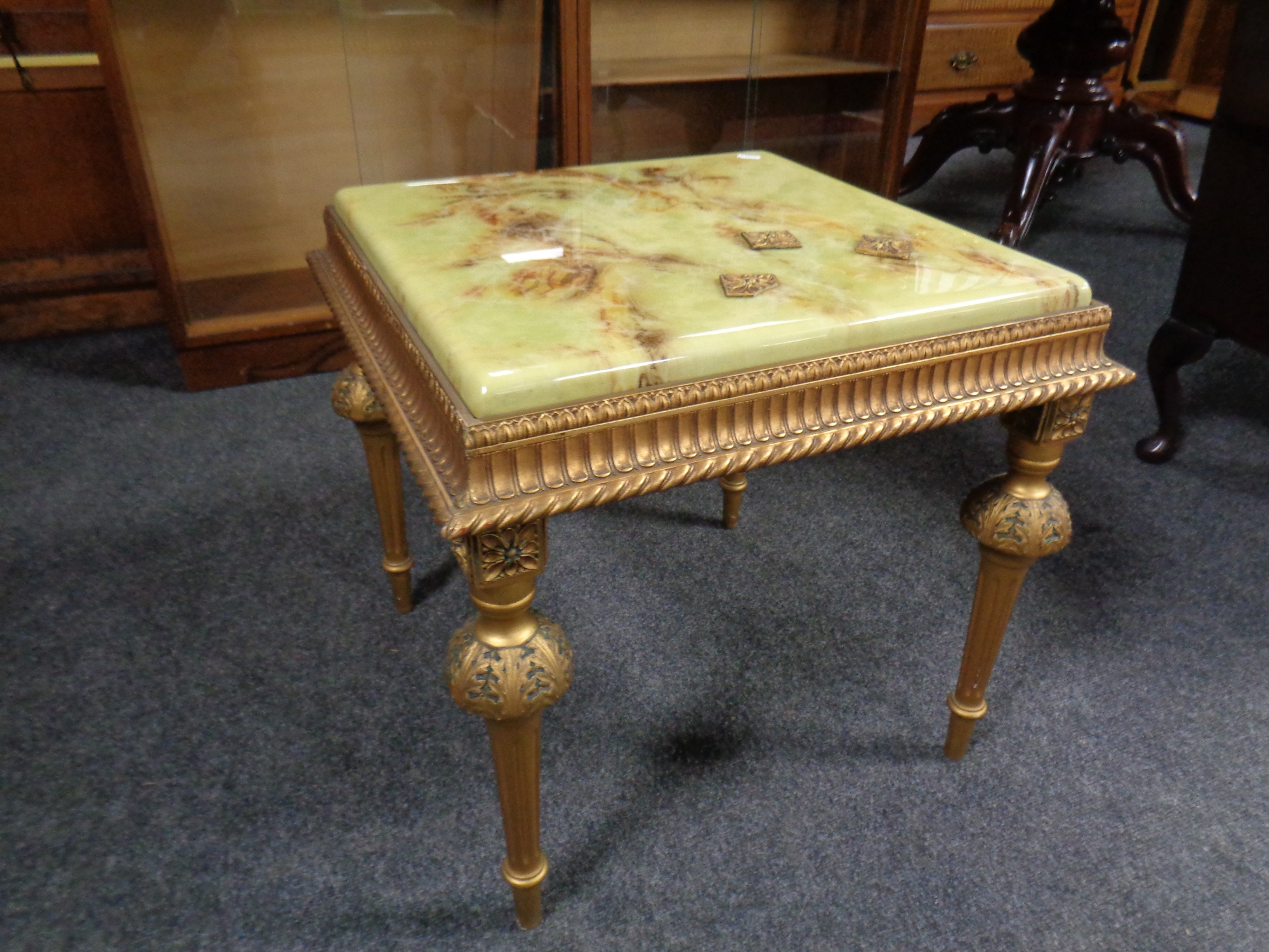 A French style gilt occasional table with faux onyx top