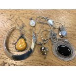 A group of silver jewellery including collar necklace, pendants set with gemstones,
