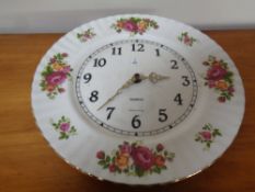 A Country Roses pattern wall clock