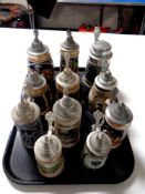 A tray of eleven German beer steins