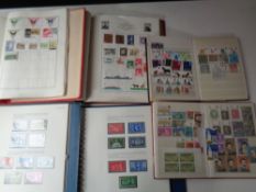 A box of six albums of British and world stamps