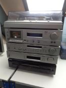 An Akai direct drive turn table, model AP-D33, Akai Stereo Cassette deck model CS-F9,