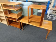 An oak coffee table on Queen Anne legs,