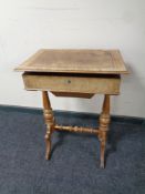 A 19th century mahogany and walnut work table