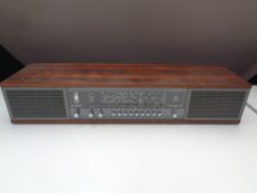 A Bang & Olufsen Beomaster 900 in rosewood effect case