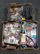 Three boxes of fixtures, fittings, tile spacers, screws,