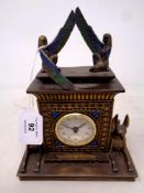 An Egyptian style mantle clock, width 16.5 cm.