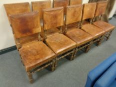 A set of nine oak dining chairs in brown studded leather (a/f)