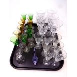 A tray of glass, two tone glasses, wine glasses,