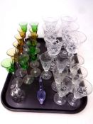 A tray of glass, two tone glasses, wine glasses,