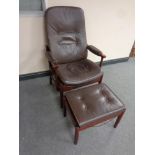 A Danish stained beech chair with brown leather upholstery with stool