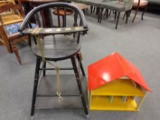 A vintage painted child's high chair together with a doll's house