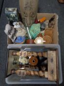 Two boxes of items including tourist carvings, vintage glass bottles, wooden pieces,