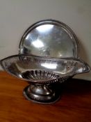 A silver plated pedestal dish and similar serving tray