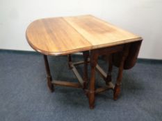 An early 20th century oak gateleg table