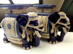 A pair of pottery elephant plant stands