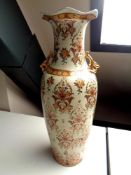 A Chinese export floral pattern vase with gilded handles, height 61 cm.