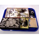 A tray of costume jewellery, bead necklaces, simulated jet,