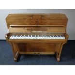 A Rogers Eungblut walnut cased Art Deco upright overstrung piano