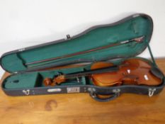 Two student violins in cases