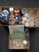 Three boxes of twentieth century glass, mantel clock under dome, blue and white lidded vase,