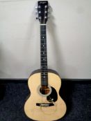 A Martin Smith W-100-N-PK acoustic guitar