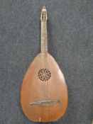 An oversized bowl backed six string mandolin (a/f)