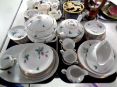 two trays of KPM tea and dinner ware decorated with pink roses