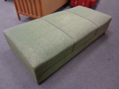 A 20th century storage day bed in green brocade