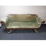 A Regency mahogany scroll arm settee upholstered in striped fabric (a/f)