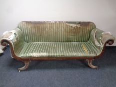 A Regency mahogany scroll arm settee upholstered in striped fabric (a/f)