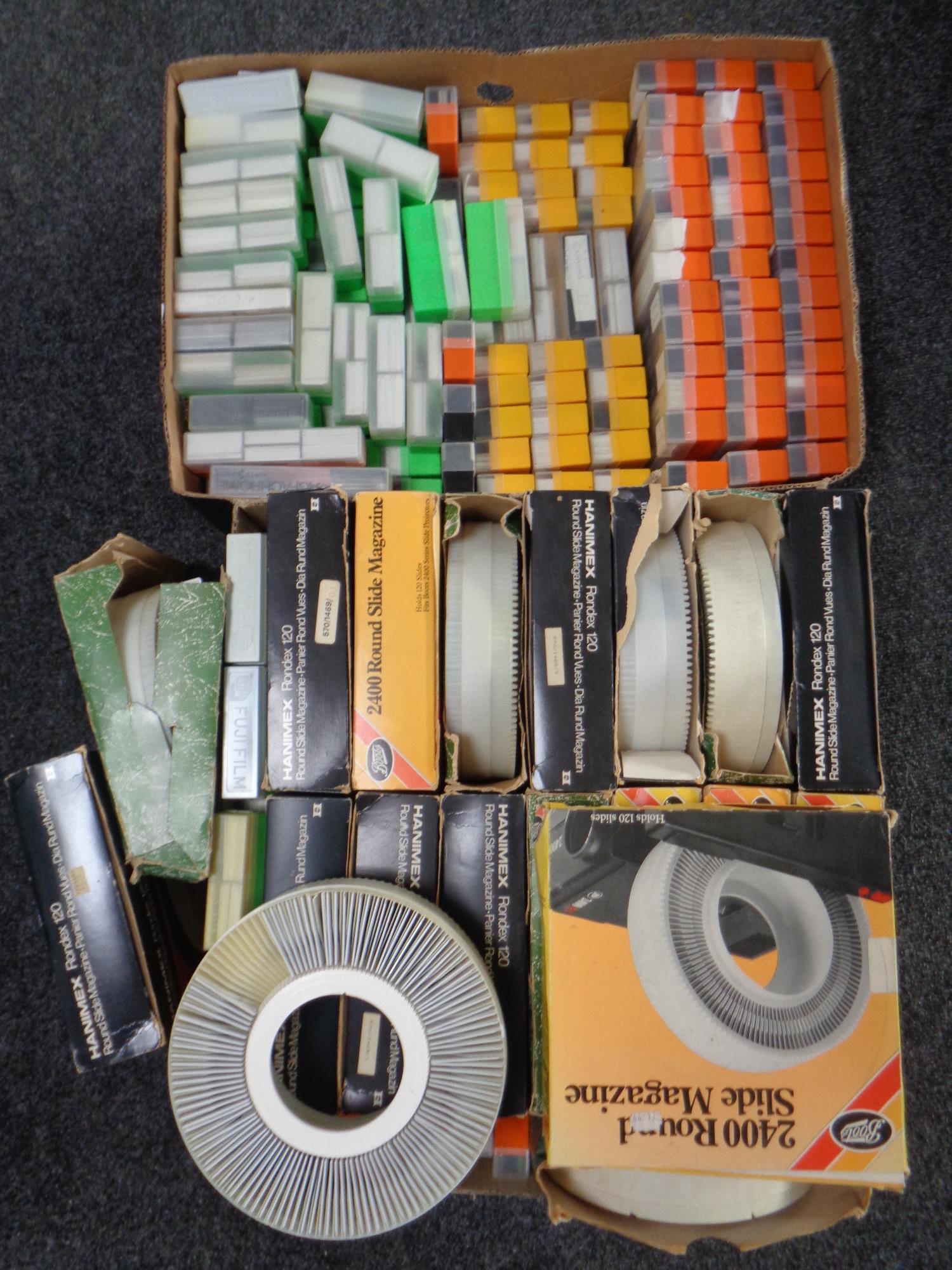 Two boxes of slide magazines,