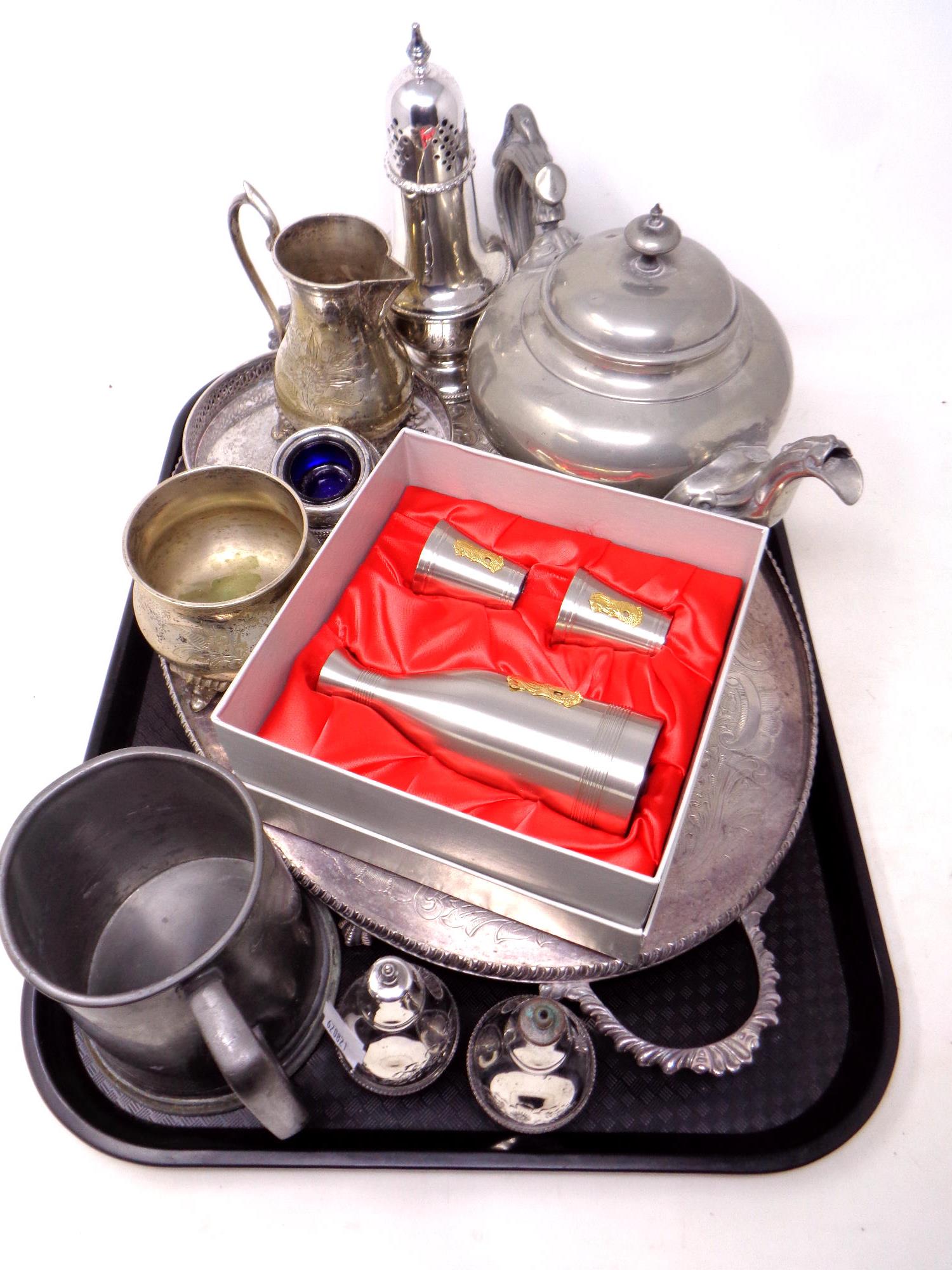 A tray of pewter wares, silver plated gallery serving tray,