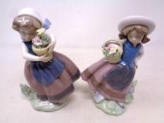 Two Lladro figures of girls holding flower baskets