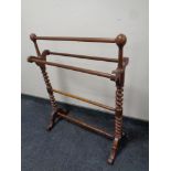 A 19th century barley twist towel rail