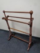 A 19th century barley twist towel rail