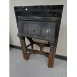 Two antique cast iron fire inserts