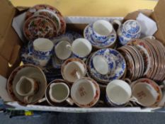 A box of a quantity of china tea ware in an oriental style