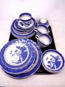 A tray of Royal Doulton Booths Real Old Willow pattern tea and dinner china.