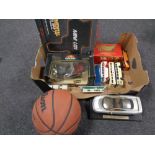 A box containing miscellanea to include regimental police water pellet guns, Wilson basketball,