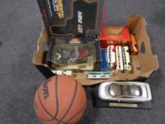 A box containing miscellanea to include regimental police water pellet guns, Wilson basketball,