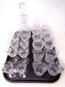 A tray of cut glass decanter with stopper, brandy glasses,
