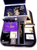 A tray containing costume jewellery, gilt metal lockets, dress rings,