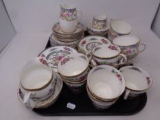 A tray of twenty one pieces of Paragon Tree of Kashmir bone tea china together with a further part