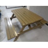 A painted wooden picnic bench