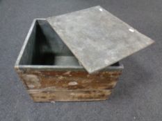 A vintage wooden lead lined and lidded crate