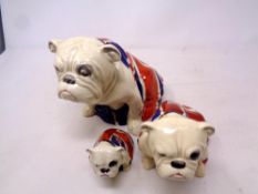 A graduated set of three Royal Doulton china bull dogs CONDITION REPORT: Largest has